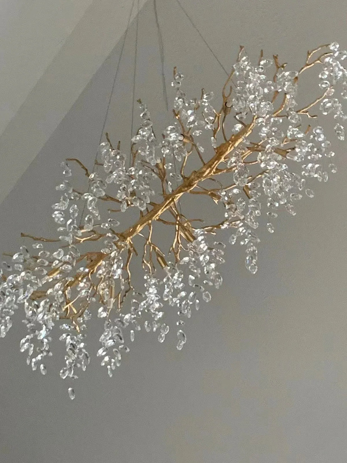 Exclusieve kroonluchter met kristallen bladeren – takken effect, moderne elegantie