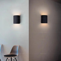 Skanto - Moderne wandlamp in lakritz hout