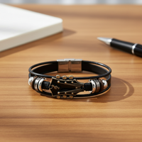 MUSIKSTRUM – Leren armband met gitaar-geïnspireerd design