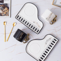 Pianissimo smaak – elegante set van kop en dienblad voor muziekliefhebbers