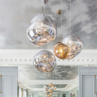 Gloeiende bol kroonluchter | Opvallend lava-ontwerp met warme LED-verlichting voor een gezellige, elegante inrichting.