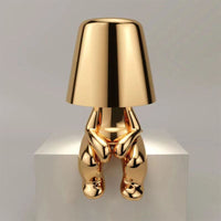 Metalen tafellamp met reflectieve artistieke vorm