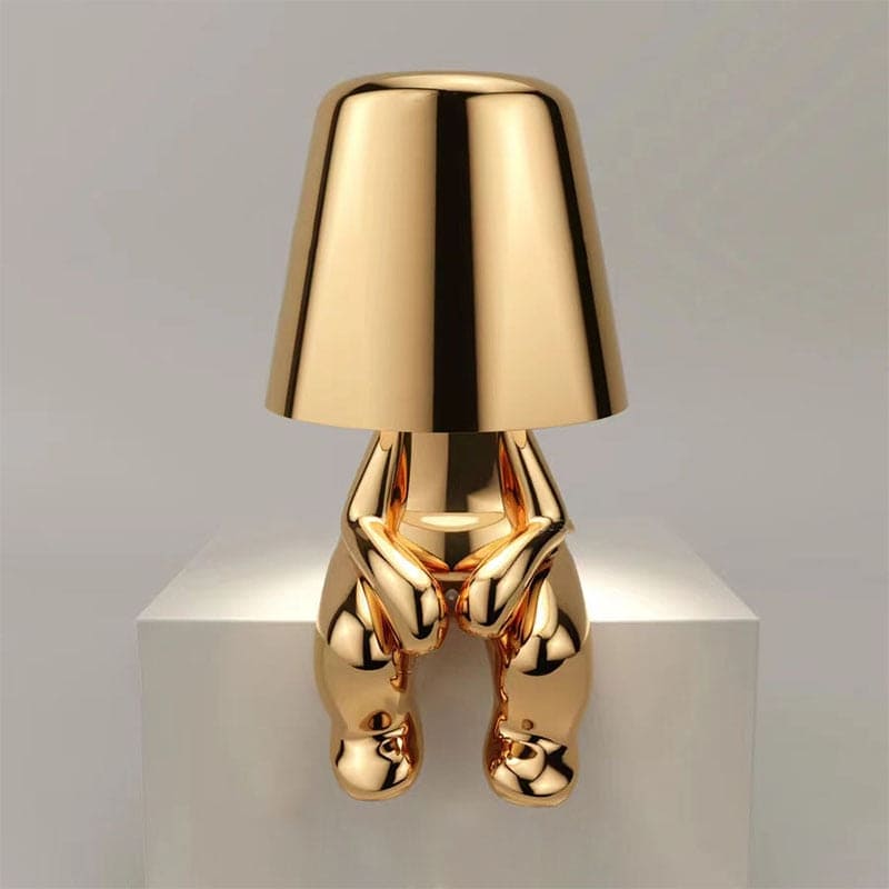 Metalen tafellamp met reflectieve artistieke vorm