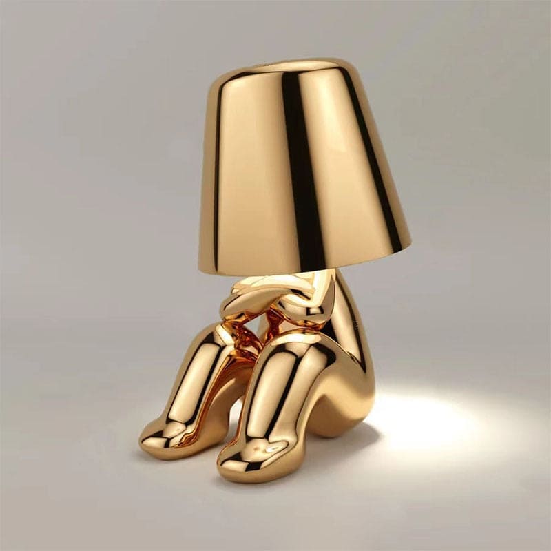 Metalen tafellamp met reflectieve artistieke vorm