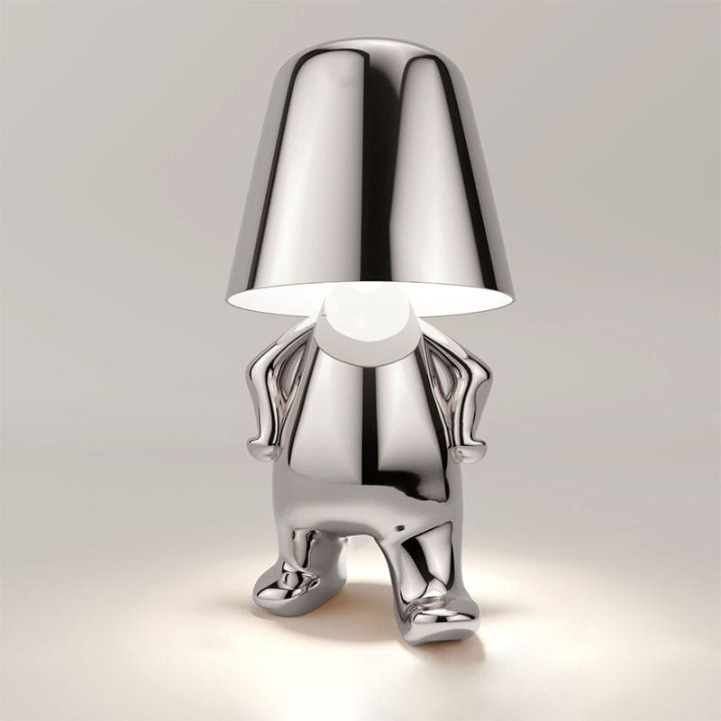 Metalen tafellamp met reflectieve artistieke vorm