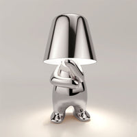 Metalen tafellamp met reflectieve artistieke vorm