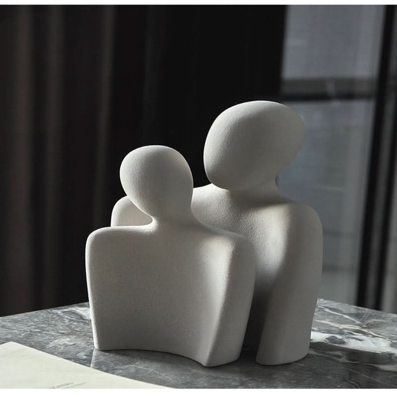 Moderne sculptuur die verbinding en tederheid symboliseert
