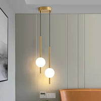 Moderne gouden hanglamp met bolvormige lampenkap | Minimalistische LED plafondlamp