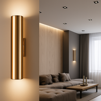 Design wandlamp cilindrische LED in goud