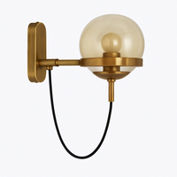 LED wandlamp van metaal en glazen bol