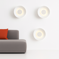 Moderne LED wandlamp in de vorm van een metalen zon Hasna