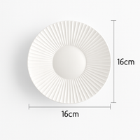 Moderne LED wandlamp in de vorm van een metalen zon Hasna