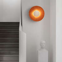Moderne LED wandlamp in de vorm van een metalen zon Hasna