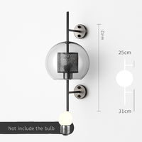 Retro wandlamp van glas en metaal
