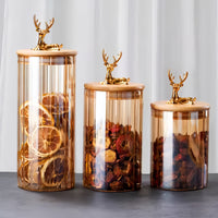 Elowen Stag Amber Afwerking Glazen Potten Set Van Drie Met Gouden Deksel