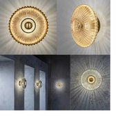 AuraFlow – Moderne glazen wandlamp met golvende lampenkap