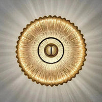AuraFlow – Moderne glazen wandlamp met golvende lampenkap
