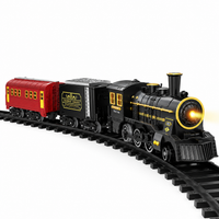 TrackMaster Pro elektrische speelgoedtrein met zwarte locomotief, rode wagon en rails op witte achtergrond