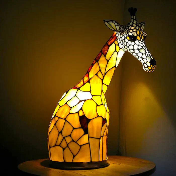 Artistieke plafondlamp met dierenmotief in glas