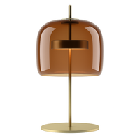 Design tafellamp met LED in goudkleurig metaal en retro glazen kap