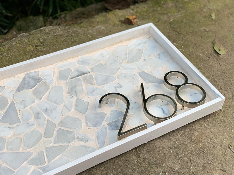 Moderne zilveren huisnummers