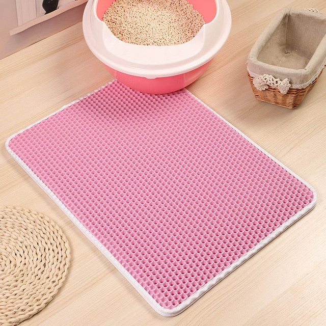 Afval Opvang Mat | Houdt vloeren schoon en vrij van gemorst strooisel Korte beschrijving: Vangt effectief kattenbakvulling op met een dubbellaags ontwerp.