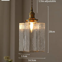 Vintage glazen hanglampen met een afwerking in messing